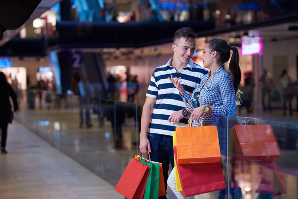 young couple with shopping bags - Photo, Image