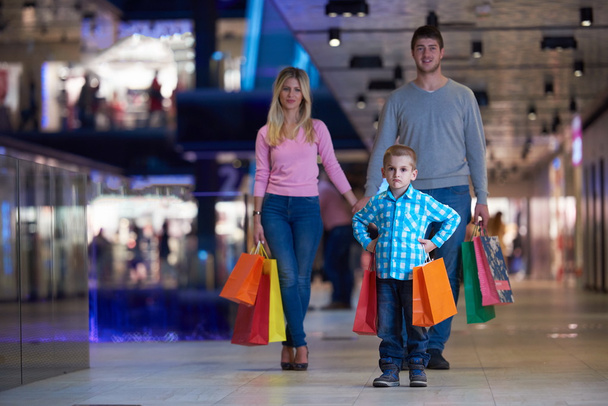 young family with shopping bags - Foto, Imagen