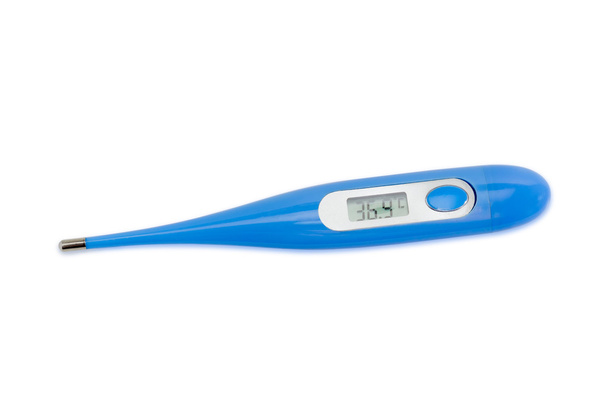 Electronic clinical thermometer on a light background - Фото, зображення