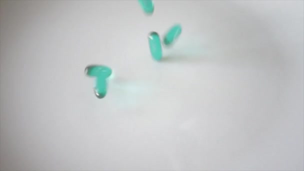 Pills fall in super slow motion - Felvétel, videó