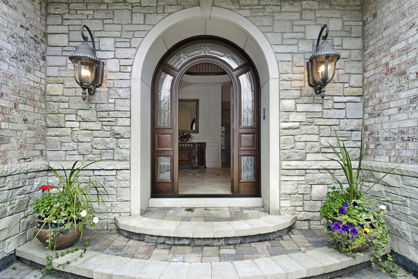Arched stone entry to luxury home - Photo, Image