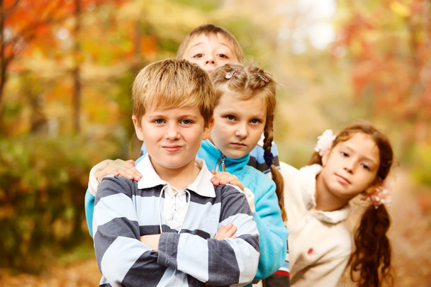 Boys and girls in autumn - Foto, afbeelding