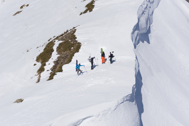 Snowboarders walking uphill for freeride - Фото, зображення
