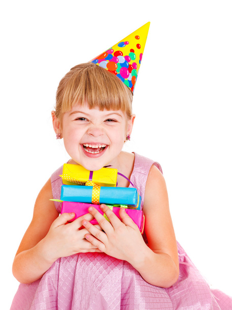 Little girl with presents and party hat - Foto, Imagen