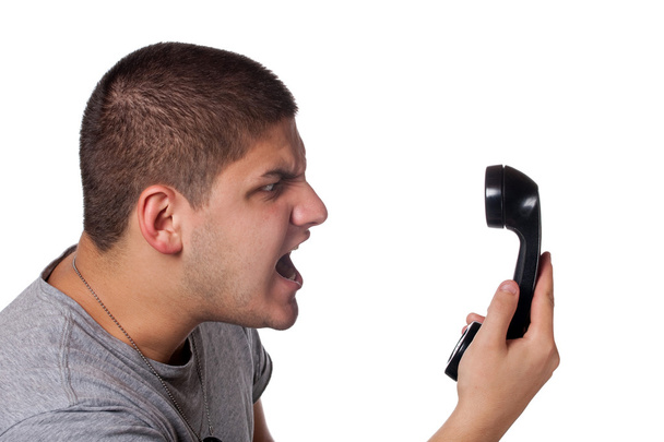 Man Screaming Into the Telephone - Foto, afbeelding