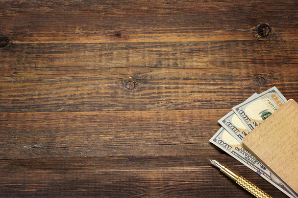 Wood Empty Background With Notebook, Money  And Golden Pen - Photo, Image
