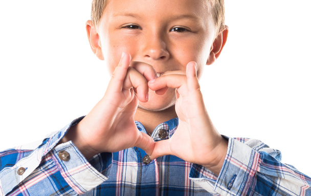 Kid making a heart with his hands - Foto, Bild