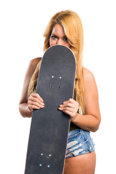 Skateboarder girl over white background - Photo, Image