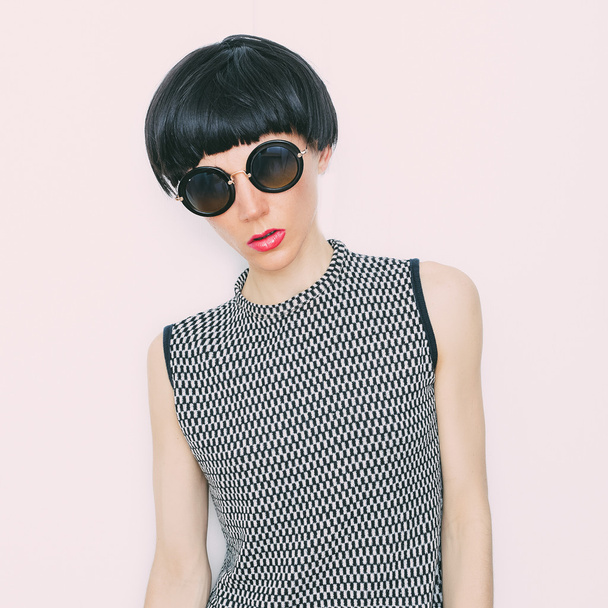 Girl in fashion sunglasses and trendy short haircut. - Photo, image