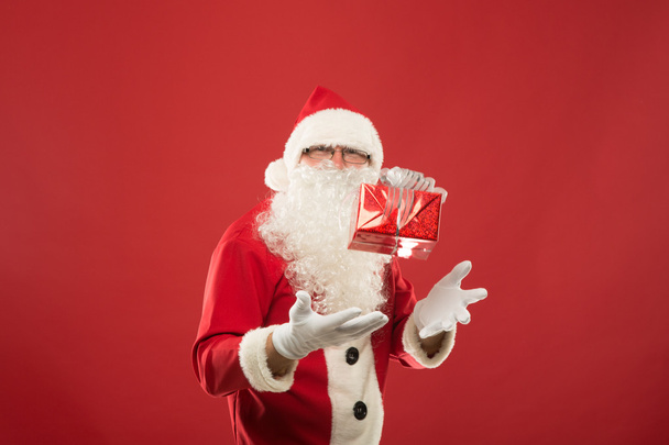 Portrait of happy Santa Claus with a huge sack - Foto, Imagen