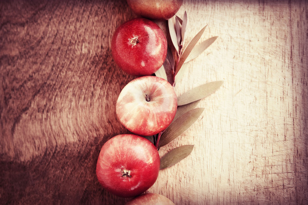 Background with little apples, autumn leaves - Fotografie, Obrázek