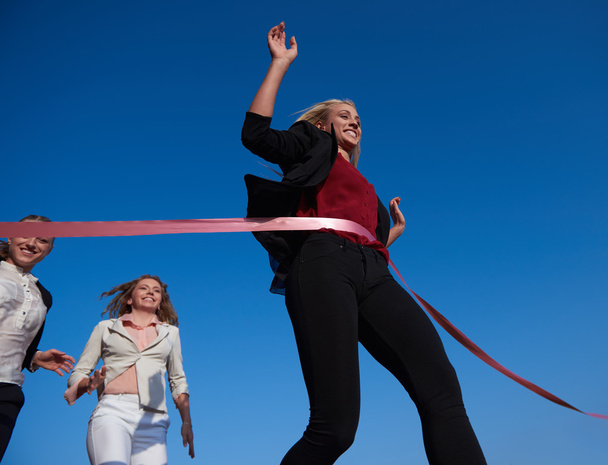 business women running on racing track - Foto, imagen