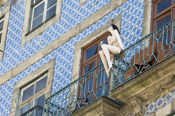 naked woman puppet on a balcony - Photo, Image