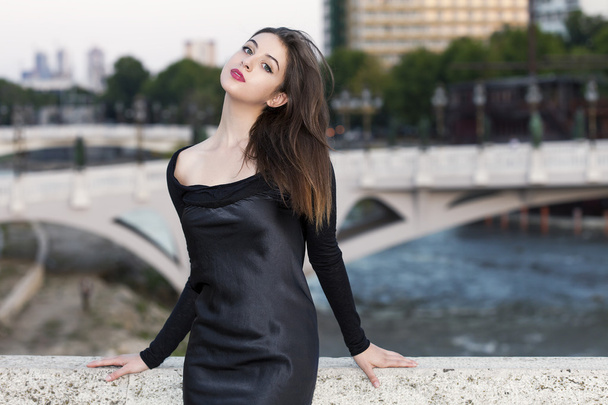 Beautiful girl portrait wearing black dress in Skopje - Foto, Bild