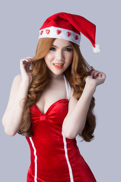 Piękny model kobieta Azji w Santa Claus ubrania - Zdjęcie, obraz