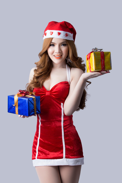 Beautiful woman in Santa Claus clothes - Фото, изображение