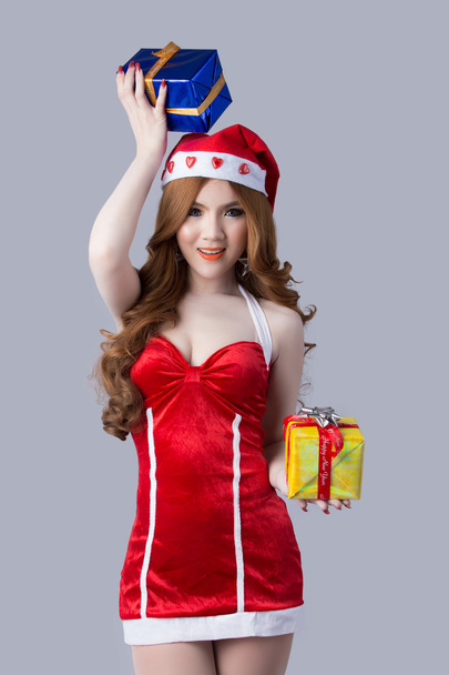 Beautiful woman in Santa Claus clothes - Photo, Image