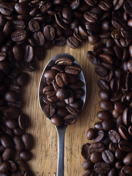 Kawa i łyżką z ziaren kawy - Zdjęcie, obraz