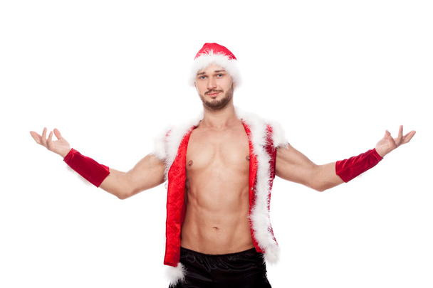 Sexy male posing in xmas costume, isolated on white - Fotó, kép