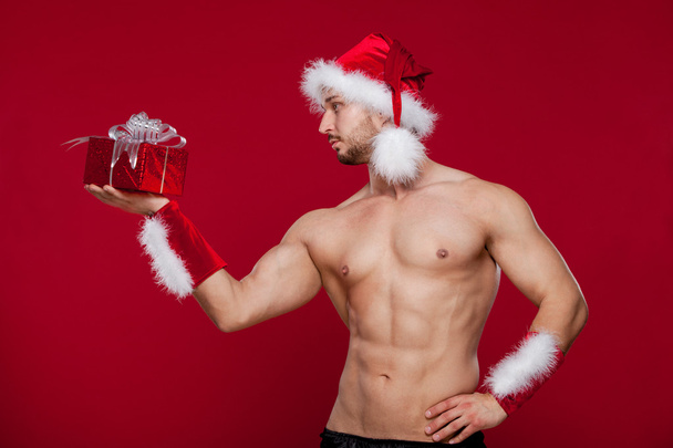 Sexy santa claus has surprise for you - 写真・画像
