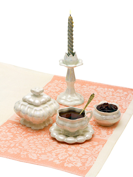 Tasse Tee und Zuckermarmelade auf Serviette - Foto, Bild