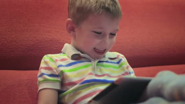 little boy playing on the tablet9 - Footage, Video