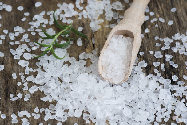 Closeup of salt on wooden table - Photo, Image