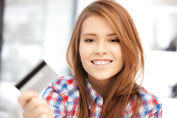 Happy woman with credit card - Фото, изображение