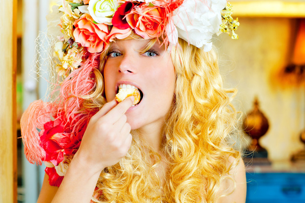 Baroque fashion blonde woman eating dona - Фото, зображення