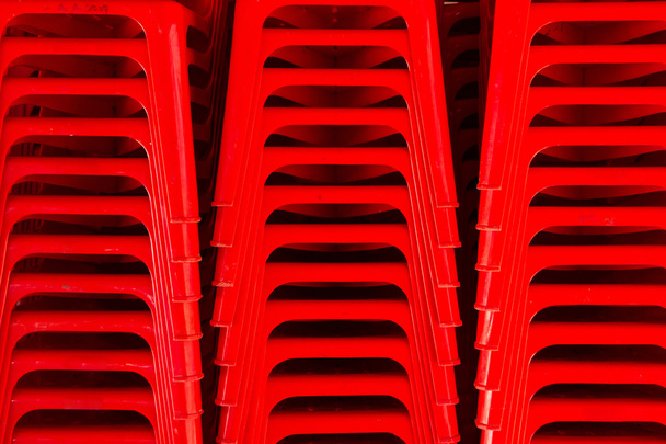 Rote Stühle stapelbar - Foto, Bild