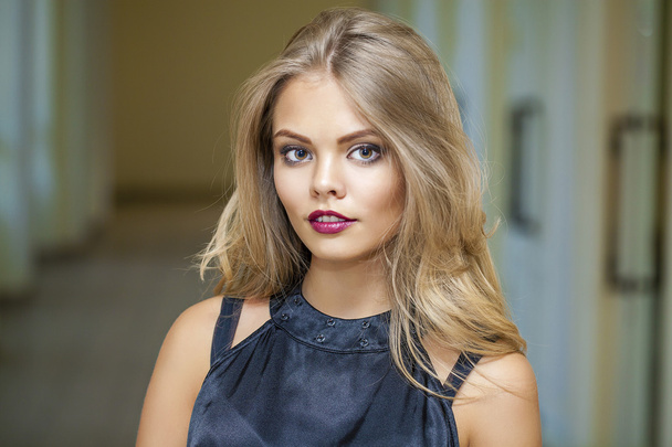 Portrait of attractive young blonde woman - Fotografie, Obrázek