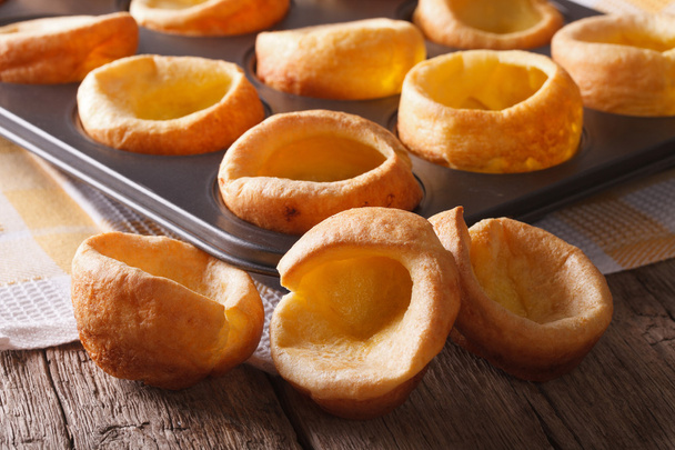 Yorkshire puddings in baking dish close up on the table. horizon - Zdjęcie, obraz