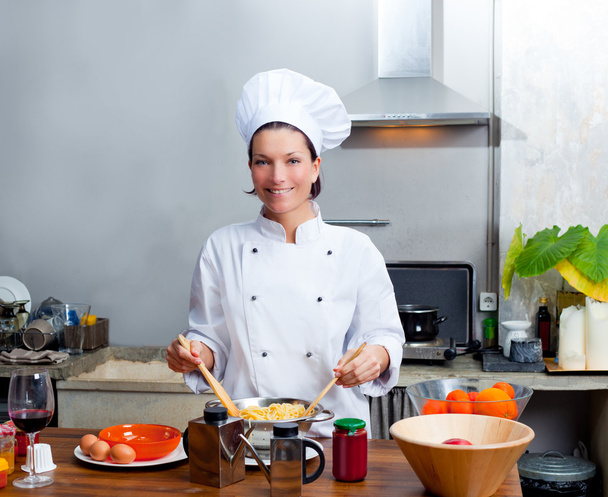 Chef woman portrait in the kitchen - Foto, Bild