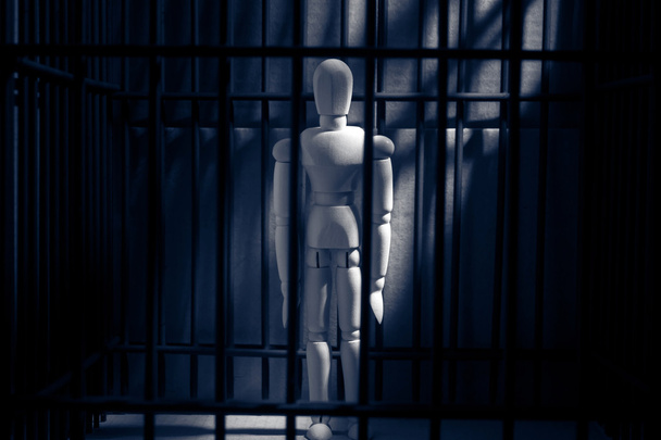 Wooden puppets in prison - Photo, Image