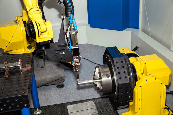 Robot industriel traitement des métaux
 - Photo, image