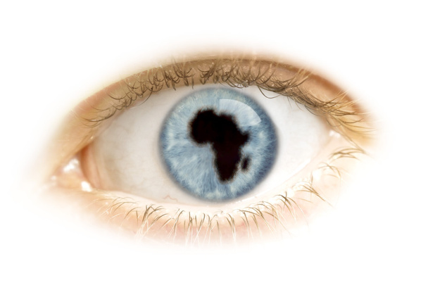 Close-up of an eye with the pupil in the shape of Africa.(series - Φωτογραφία, εικόνα