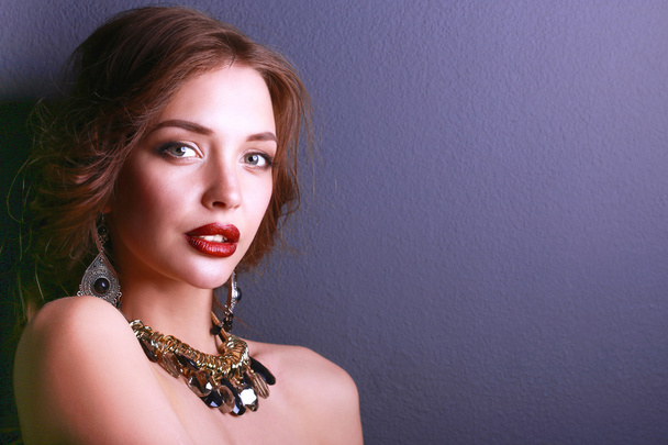 Portrait of young beautiful woman with jewelry - Zdjęcie, obraz