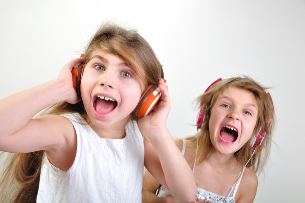 Shouting children with headphones - Fotó, kép