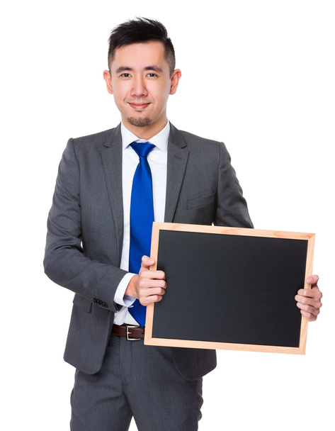 Молодий азіатський бізнесмен у діловому костюмі
 - Фото, зображення