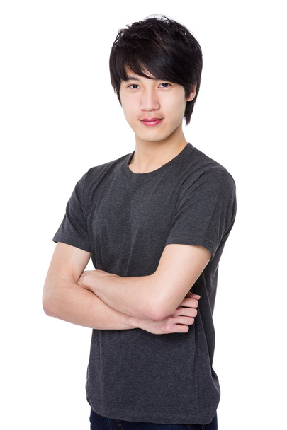 Asiático joven hombre en gris camiseta
 - Foto, Imagen