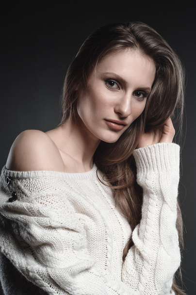High fashion look, closeup beauty portrait of young beautiful woman model with natural makeup. Beautiful girl in white pullover, sweater. Fashion photo - Photo, Image
