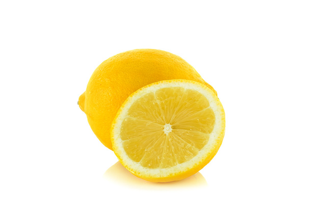 白い背景上に分離されて黄色のレモン - 写真・画像