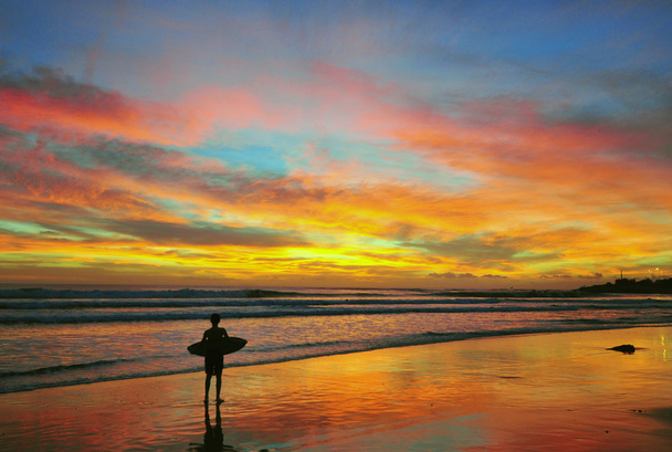 Surfing on the sunset - 写真・画像