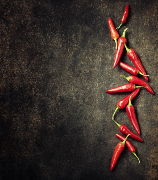 Vibrant red mexican hot chilli pepper - Fotoğraf, Görsel