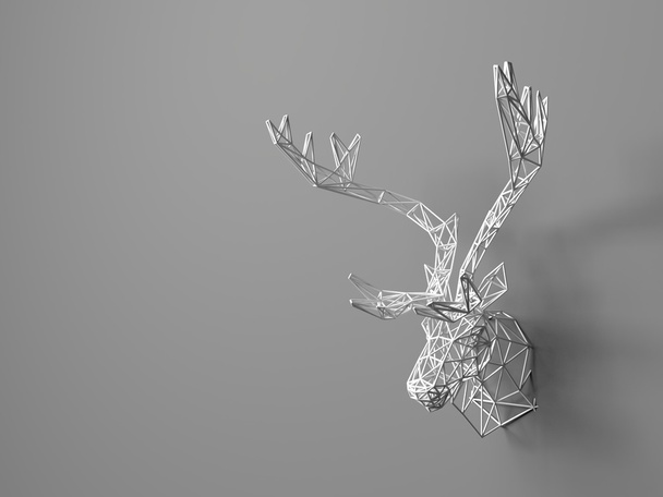 Artificial deer head hanging on the wall. Polygonal head of a deer. Deer from the three-dimensional grid. The object of art on the wall. Volume model. Meshwork. - Φωτογραφία, εικόνα