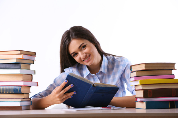 Young girl with books isolated - Foto, Imagem