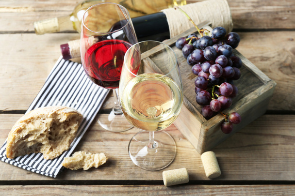 Still life of wine and bread on wooden t background - Foto, immagini