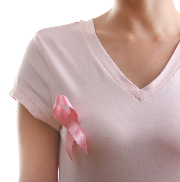 Woman with aids awareness pink ribbon - Foto, Imagen