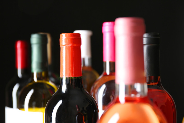 different wine bottles - Фото, зображення