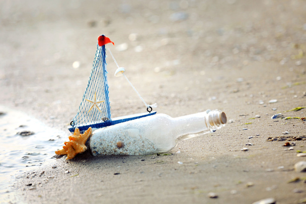 Glass bottle with sand - Foto, Bild